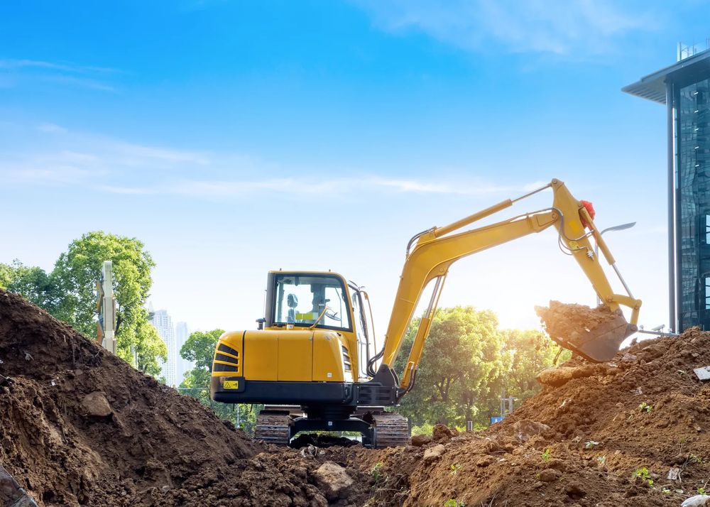 Excavator clearing a jobsite for Jerry Cheshire Land Clearing Services